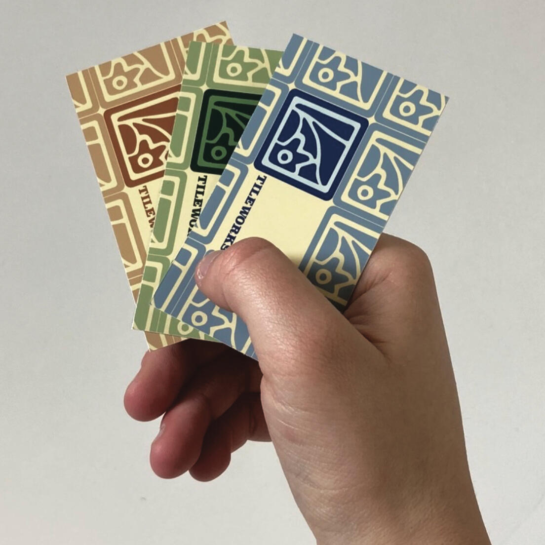 A line drawing of the designer (they're waving at the person on the other side of the screen)